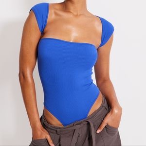 PrettyLittleThing blue ribbed bodysuit with back cutout